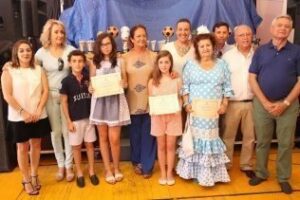 Los ganadores del concurso de microrrelatos de la Feria Real reciben sus premios